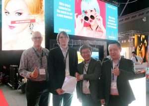 Andrew Hope Managing Director at AVL Media Group and Michael Hao CEO INFILED both in the center of the photo